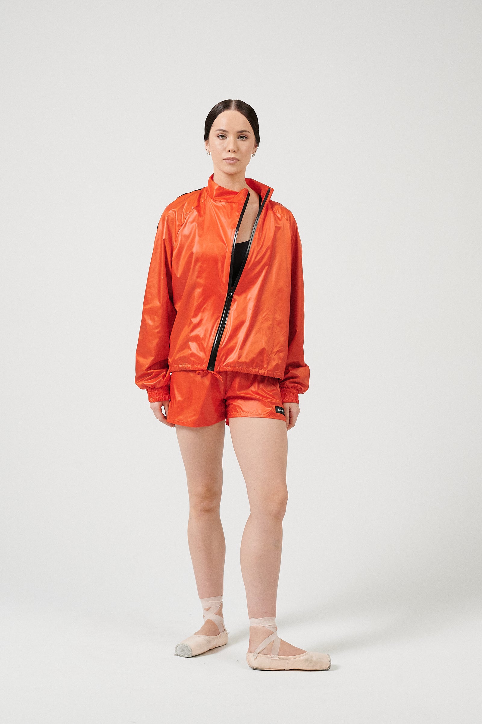 FUTURE GISELLE COLLECTION 24 | Futuristic red sports suit with shorts